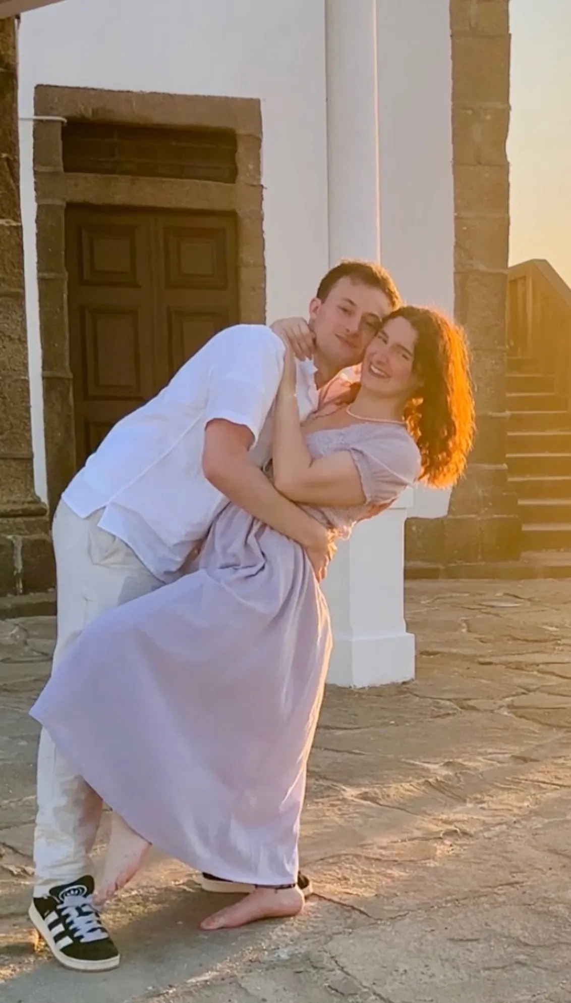 Sailor and Adilhan cheek to cheek at sunset, as if in the middle of a dance.